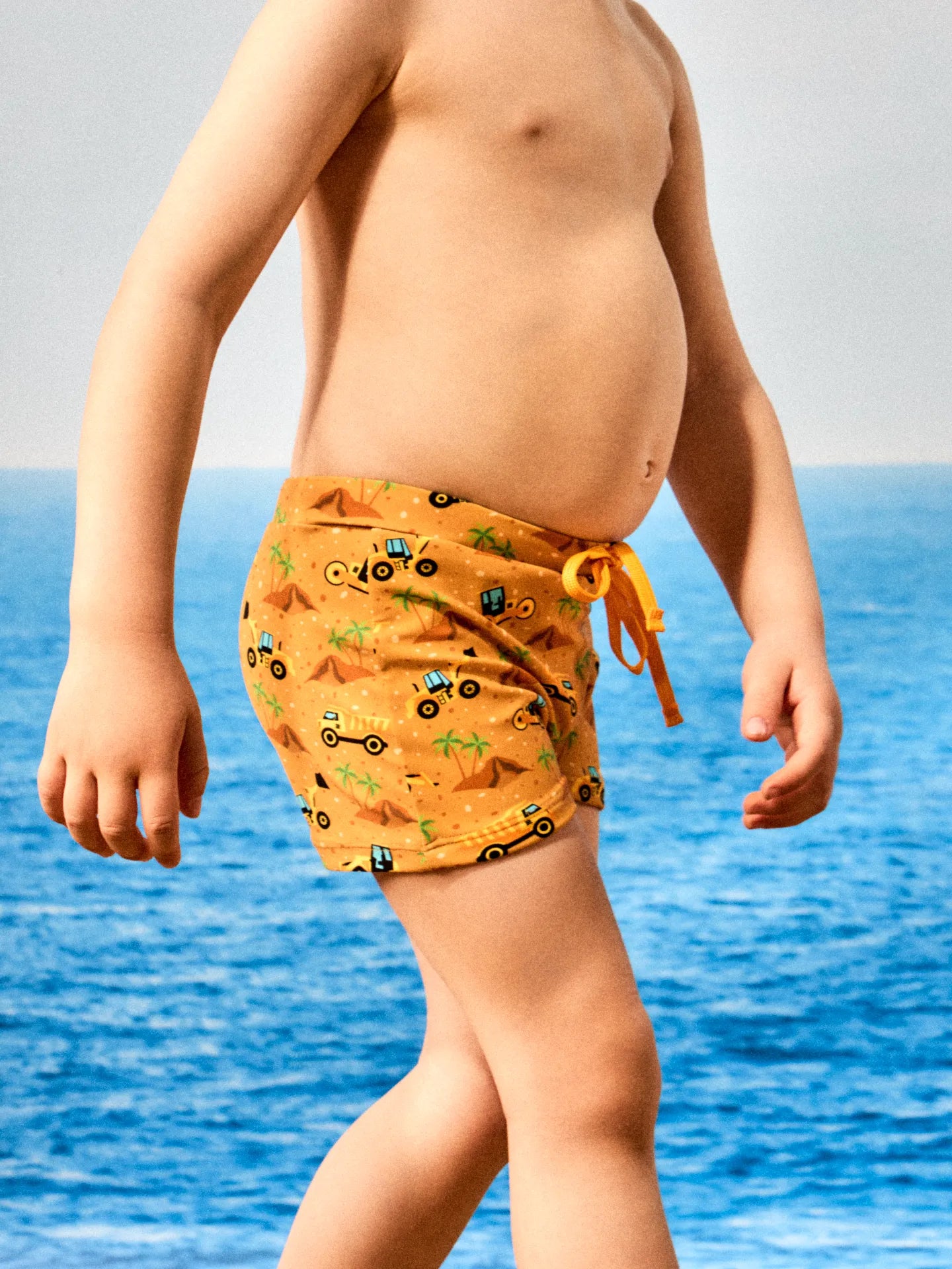 kids-elastic-swim-shorts-excavator-on-the-beach-4a/4ab68409ff0ffaa4a7aedfc68914232760ce65f7